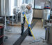 professional-cleaner-wearing-protection-uniform-cleaning-floor-production-plant